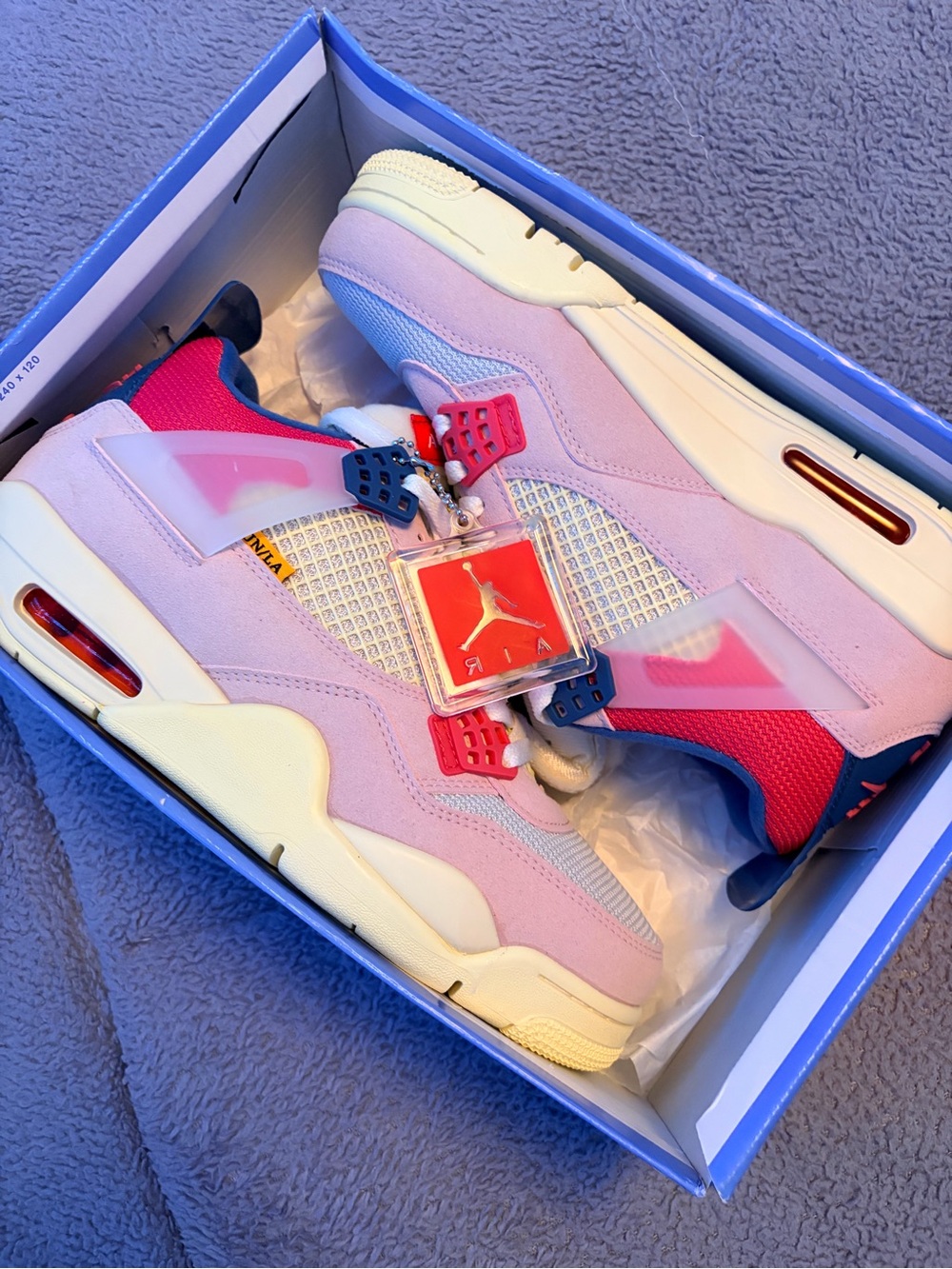 Jordan Pink Suede Sneakers with Red and Blue Accents